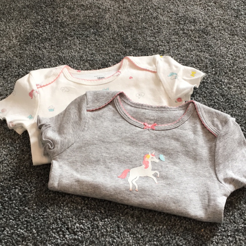 2 pc Infant girl bodysuits with short sleeves.